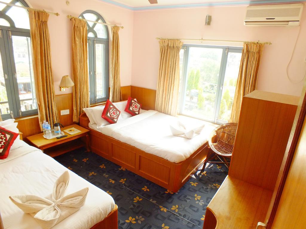 Hotel Greenland Pokhara Quarto foto